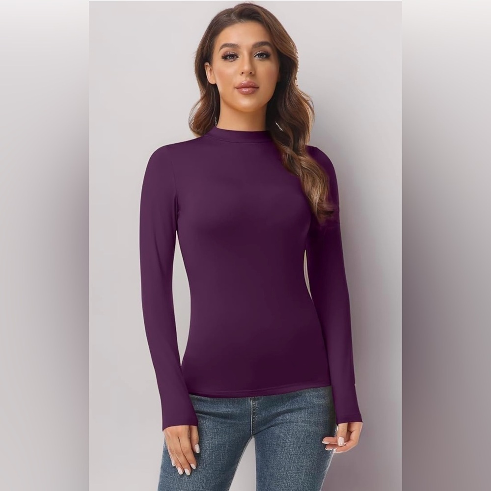 NWT Elegant Purple bod-con blouse